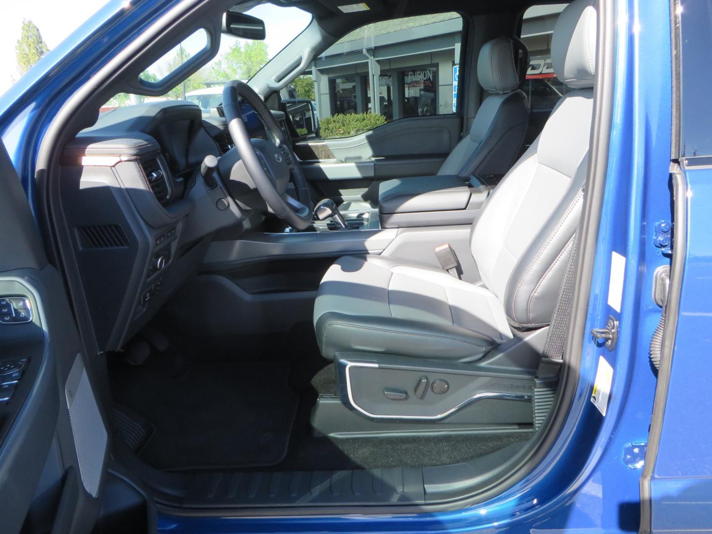 2022 BLUE /BLACK Ford F-150 Lariat Crew Cab 4WD (1FT6W1EV6NW) , located at 2630 Grass Valley Highway, Auburn, CA, 95603, (530) 508-5100, 38.937893, -121.095482 - Tired of gas prices and still want to look cool? Check out this Ford Lightning featuring a RC level kit, Nitto Ridge Grappler tires, Fuel Rebel wheels, Sinister front and rear bumpers, Baja Designs leds, Rigid Industries Leds, Bakflip F1, and window tint. - Photo#32